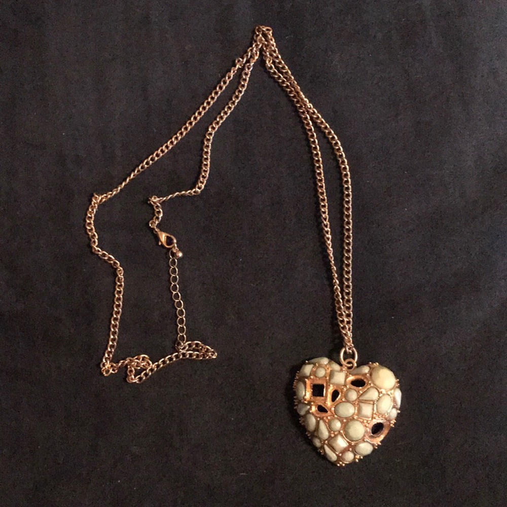 Gold heart necklace with sky blue jewels